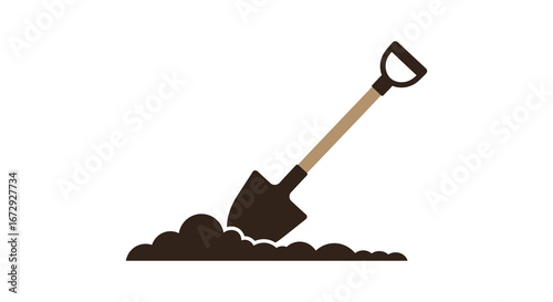 A shovel digging into a pile of dirt on the ground