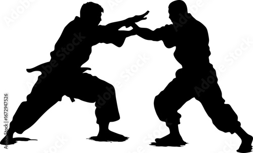 silhouette of two pencak silat practitioners sparring with open hand blocks and kicks