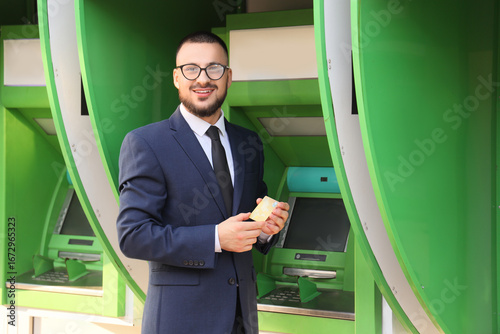 Young businessman with cred...