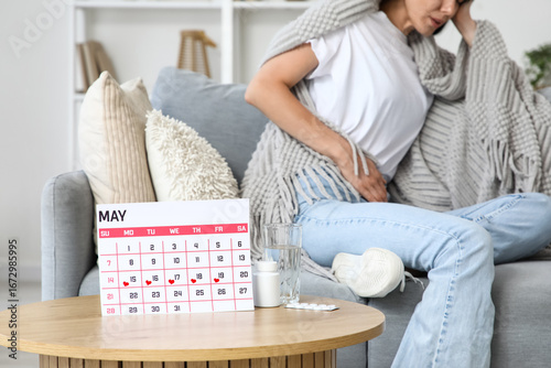 Menstrual calendar with pil...