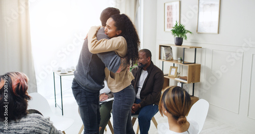 Billede på lærred People, hug and mental health in office, therapy and compassion for AA meeting, healing and support