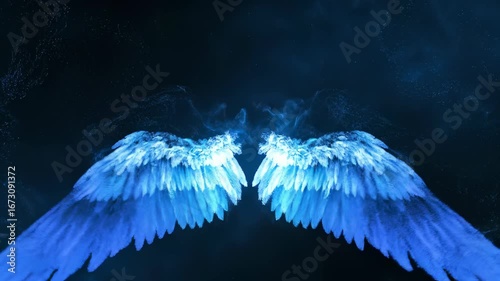 Two luminous blue angel wings against a dark, atmospheric background, representing spirituality.