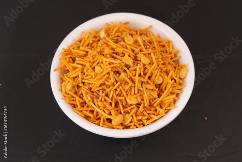 Indian fasting upwas items eaten during fesivals as religious belief. Snacks like potato chips, tikha chivda, french fries, farali pizza with jain sauce.Breakfast lunch platter indian