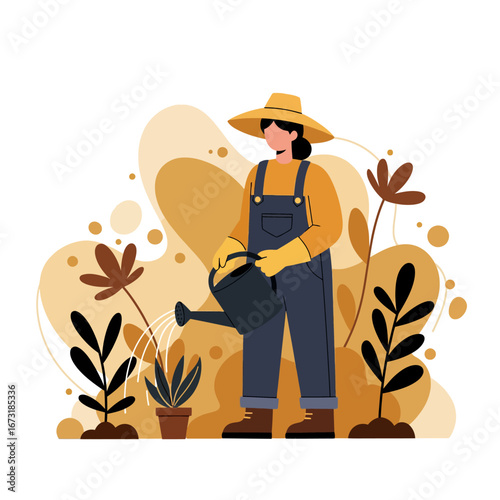 Female gardener in a straw hat and overalls watering plants.