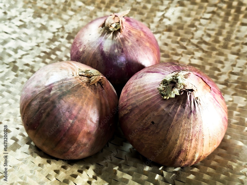 Fototapeta premium Fresh onions a healthy vegetarian cooking ingredient