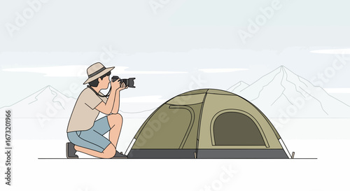 Photographer Capturing Majestic Mountain Scene Near Tent at Campsite Expedition Adventure