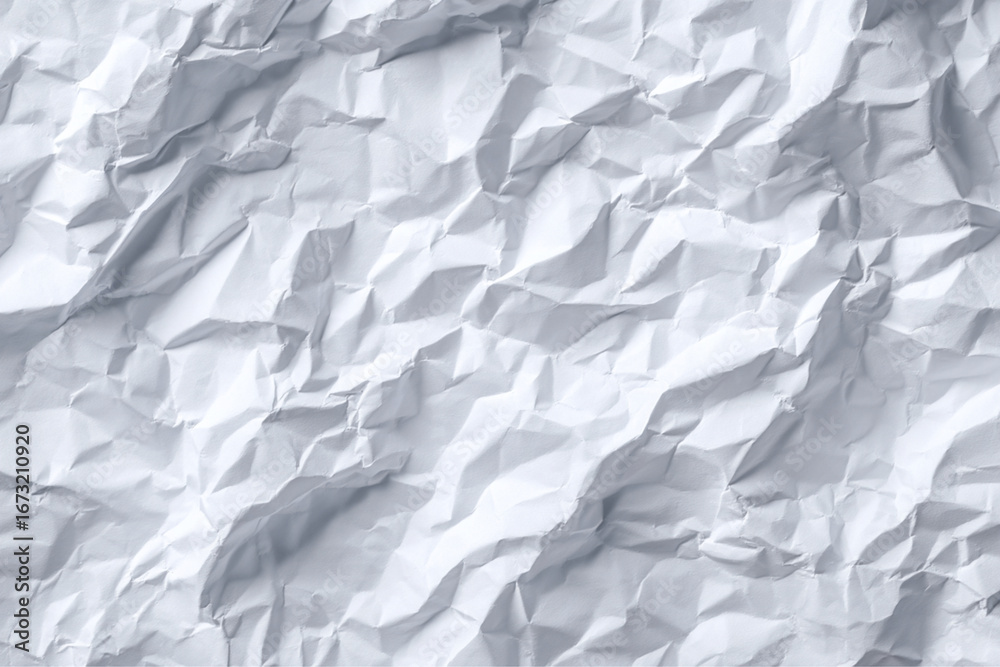 Obraz premium A close up of white crumpled paper with shadows and light texture