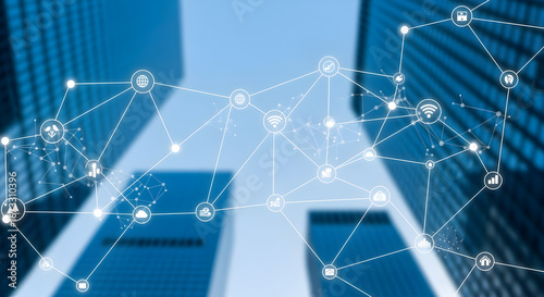 Abstract Network Overlay on Modern Blue Skyscrapers Underneath Blue Sky View