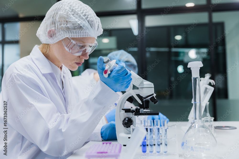 Fototapeta premium Scientist working in science lab. Medical lab people, Pharmaceutical medicine research laboratory.
