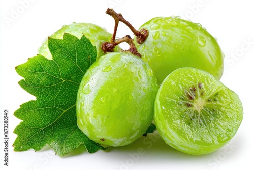 Fresh green grapes with water droplets and leaf