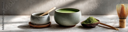 Matcha tea ceremony preparation with bowl, whisk and powder