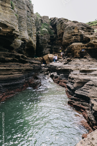 Scenery around Yongmeori Coast(Dragon head coast), a tourist attraction famous for Multistory layered rough and strange sedimentary rocks in Jeju Island, South Korea.