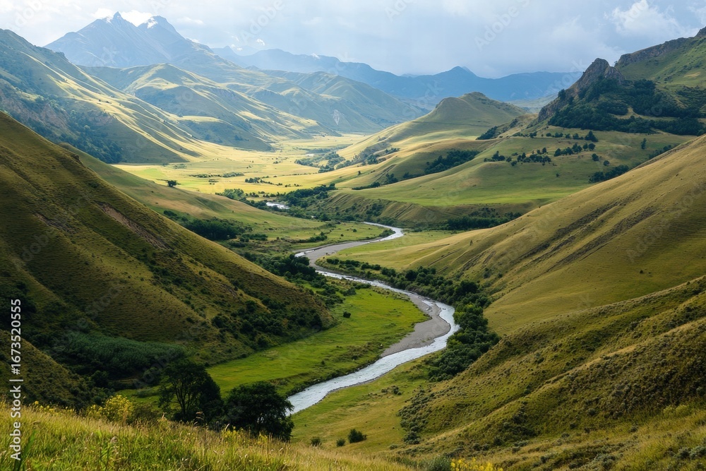 Fototapeta premium Green hills with scenic river valley