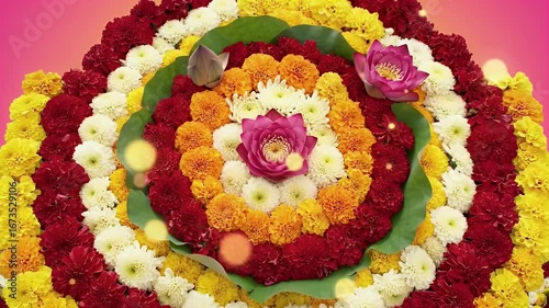 Bathukamma video banner, Colorful Bathukamma flower arrangement with concentric layers of marigold, chrysanthemum, lotus and jasmine