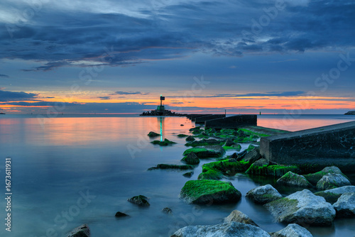 Fototapeta Naklejka Na Ścianę i Meble -  Sunset over the Baltic Sea beach in Gorki Zachodnie, Gdansk. Poland