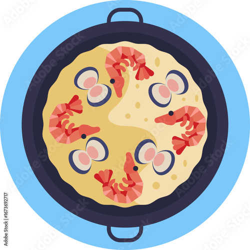 Traditional Spanish rice dish with seafood, cooked in a wide shallow pan.