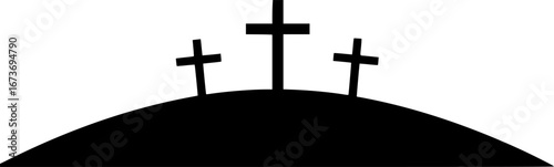 Three crosses on hill symbolizing crucifixion of Jesus Christ on Good Friday
