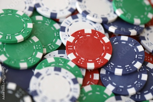 Poker Table With Poker Chips Turns In Casino. Many Poker Chips Spins on the Table