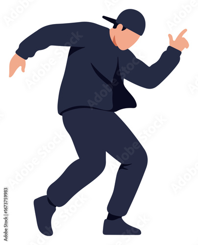 A young man in dark clothing dynamically performs a hip-hop dance move, showcasing energy and rhythm.