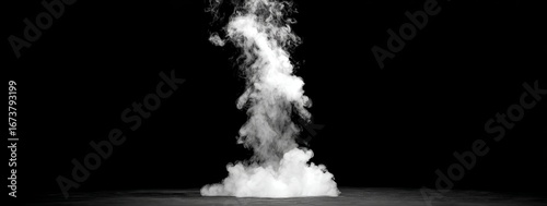 Mysterious white smoke swirling upwards against a dark background, creating a dramatic and ethereal visual effect