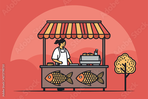 A vibrant street vendor stall in Japan, selling freshly made taiyaki, golden brown fish-shaped cakes filled with sweet red bean paste.