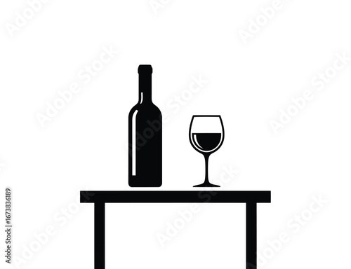 Silhouette of wine bottle and glass on a table