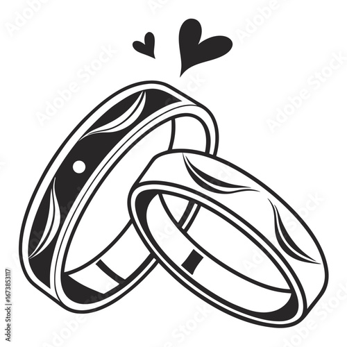 Two wedding rings together with hearts symbolizing love and marriage celebration