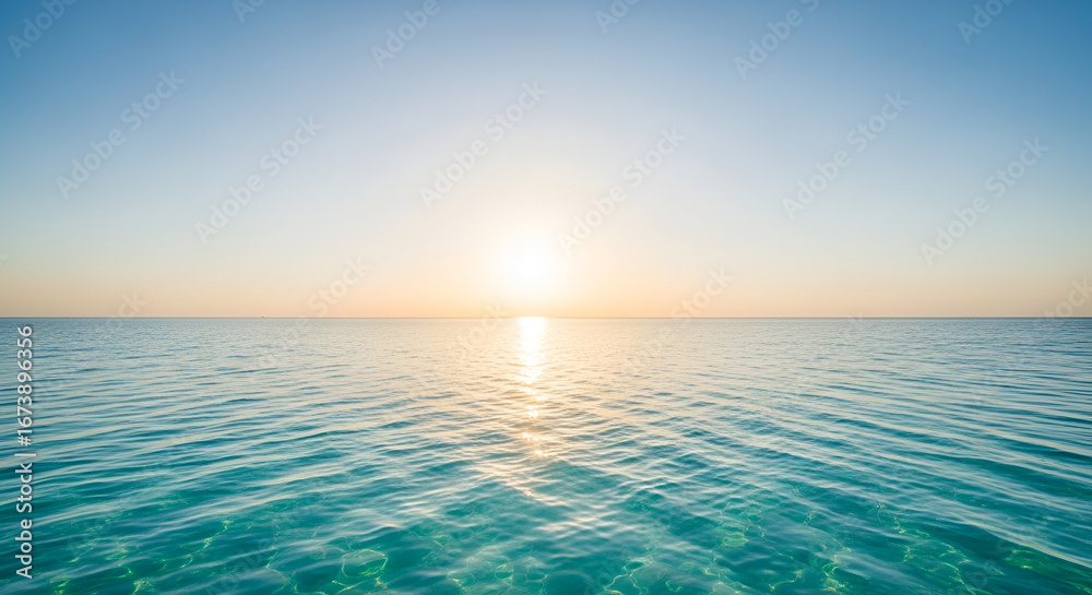 Obraz premium Ocean Sunset with Calm Waves