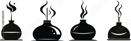 Aromatherapy diffuser set with wisping vapor and flames silhouette