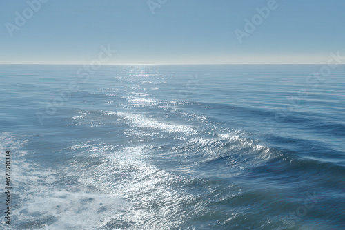 aerial view of ocean surface captures intricate dance of light and shadow across water