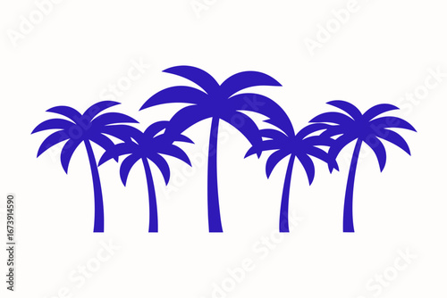 A stunning tropical silhouette of palm trees at sunset on a sandy beach