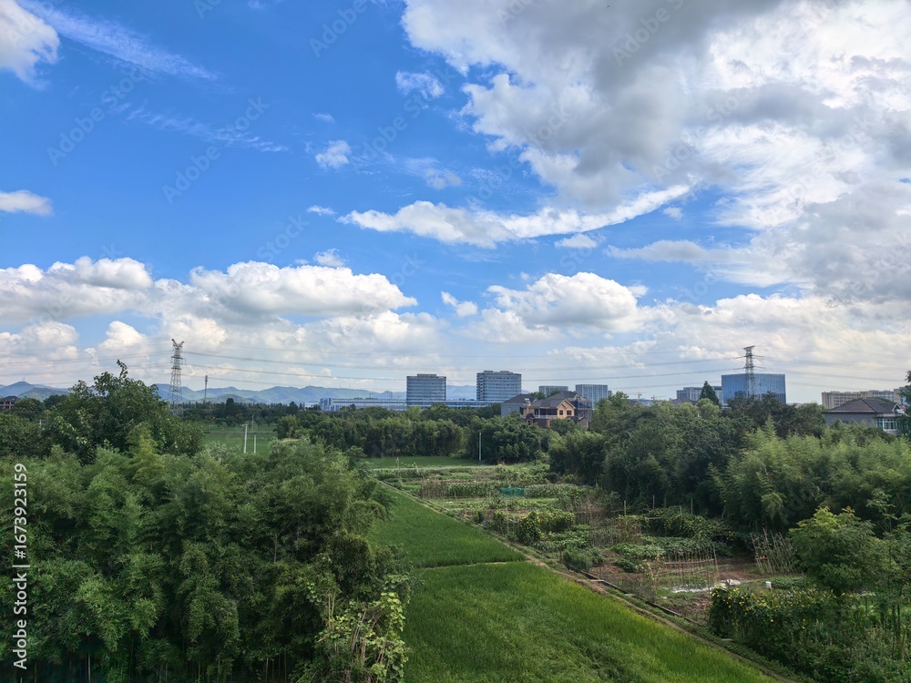 Fototapeta premium clouds over the city