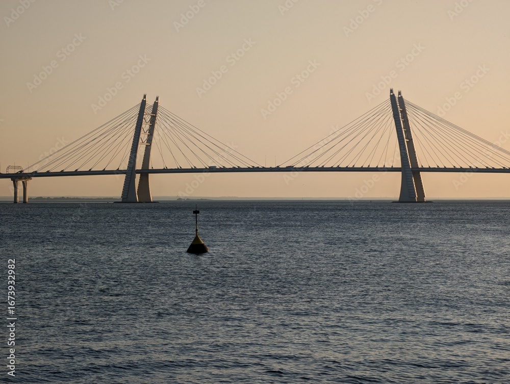 Fototapeta premium Scenic Sunset View of a Modern Cable-Stayed Bridge