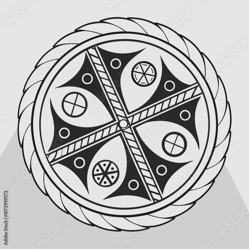 Intricate circular celtic knotwork design with cross and symbols