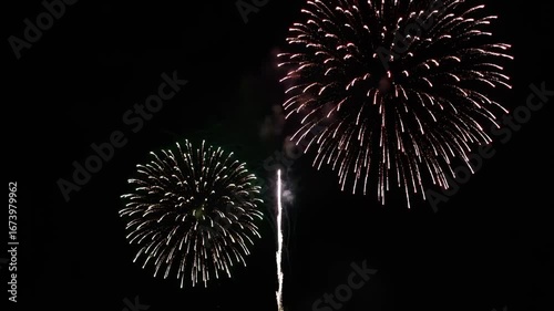 Bright Festive Fireworks Display Illuminating the Night Sky