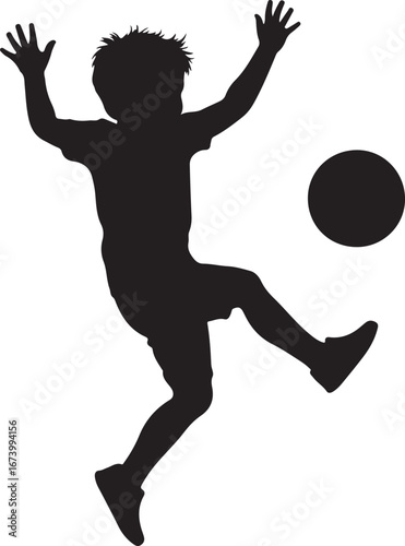 Black silhouette of a boy kicking a soccer ball football