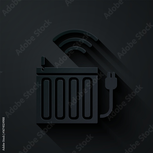 Paper cut Smart heating radiator system icon isolated on black background. Internet of things concept with wireless connection. Paper art style. Vector