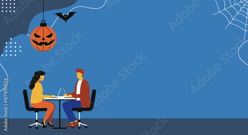 Two colleagues collaborate on laptops in an office, with festive Halloween decorations creating a unique seasonal business environment. Ideal for autumn work concepts or holiday promotions.