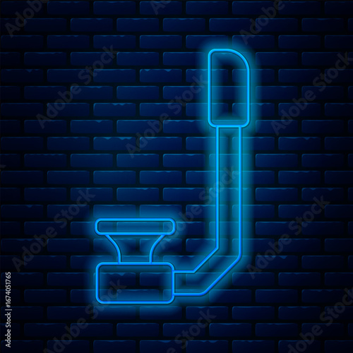 Glowing neon line Snorkel icon isolated on brick wall background. Diving underwater equipment. Vector