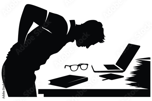 Silhouette of a person experiencing back pain while working at a desk with a laptop