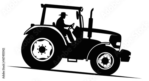 Silhouette of a farmer driving a tractor, working on a field.