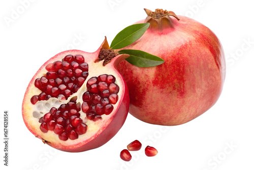 Fresh pomegranate fruit halved and whole isolated on white background