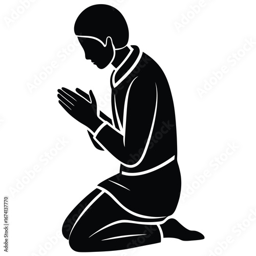Man kneeling with hands clasped in prayer praying