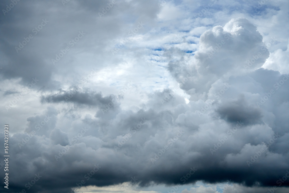 Fototapeta premium storm clouds over the blue sky