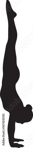 Silhouette of gymnast performing handstand exercise
