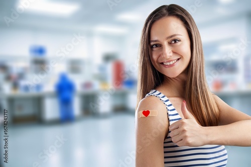 Happy donor arm with heart on bandage Free Download Happy donor arm with heart on bandage - GFXLoad