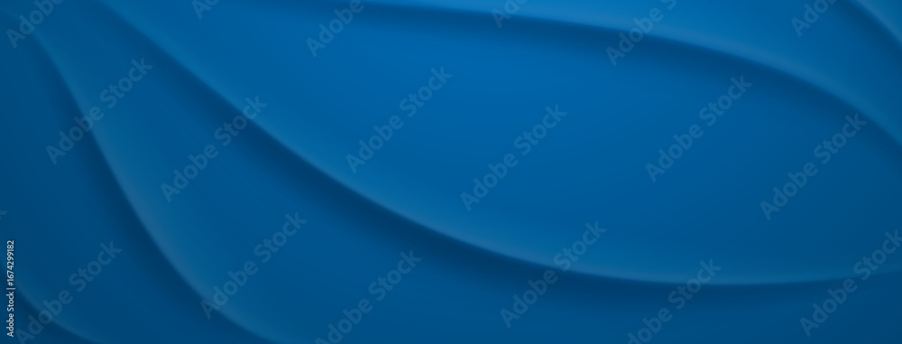 Fototapeta premium Smooth blue curves create a flowing abstract background effect.