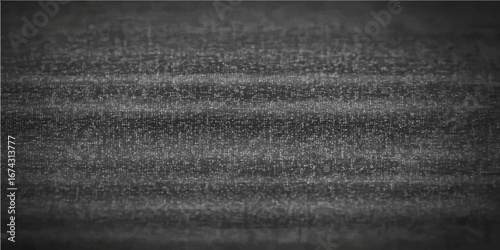 An aged black leather and gray fabric texture with a rough canvas pattern