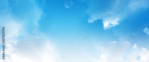 Abstract painterly blue sky with soft white clouds and light rays
