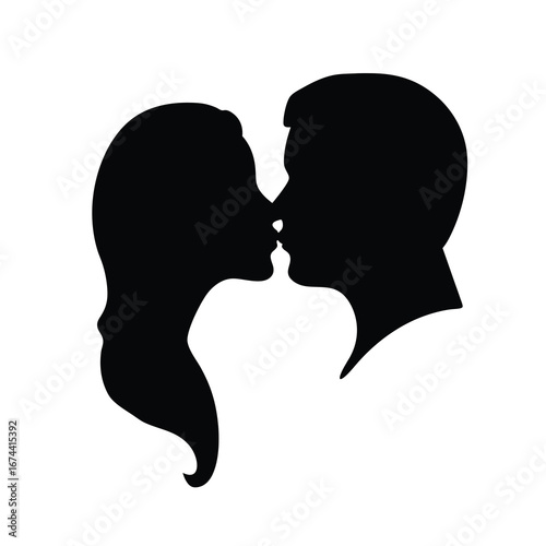 A romantic silhouette of a couple in a loving embrace kiss